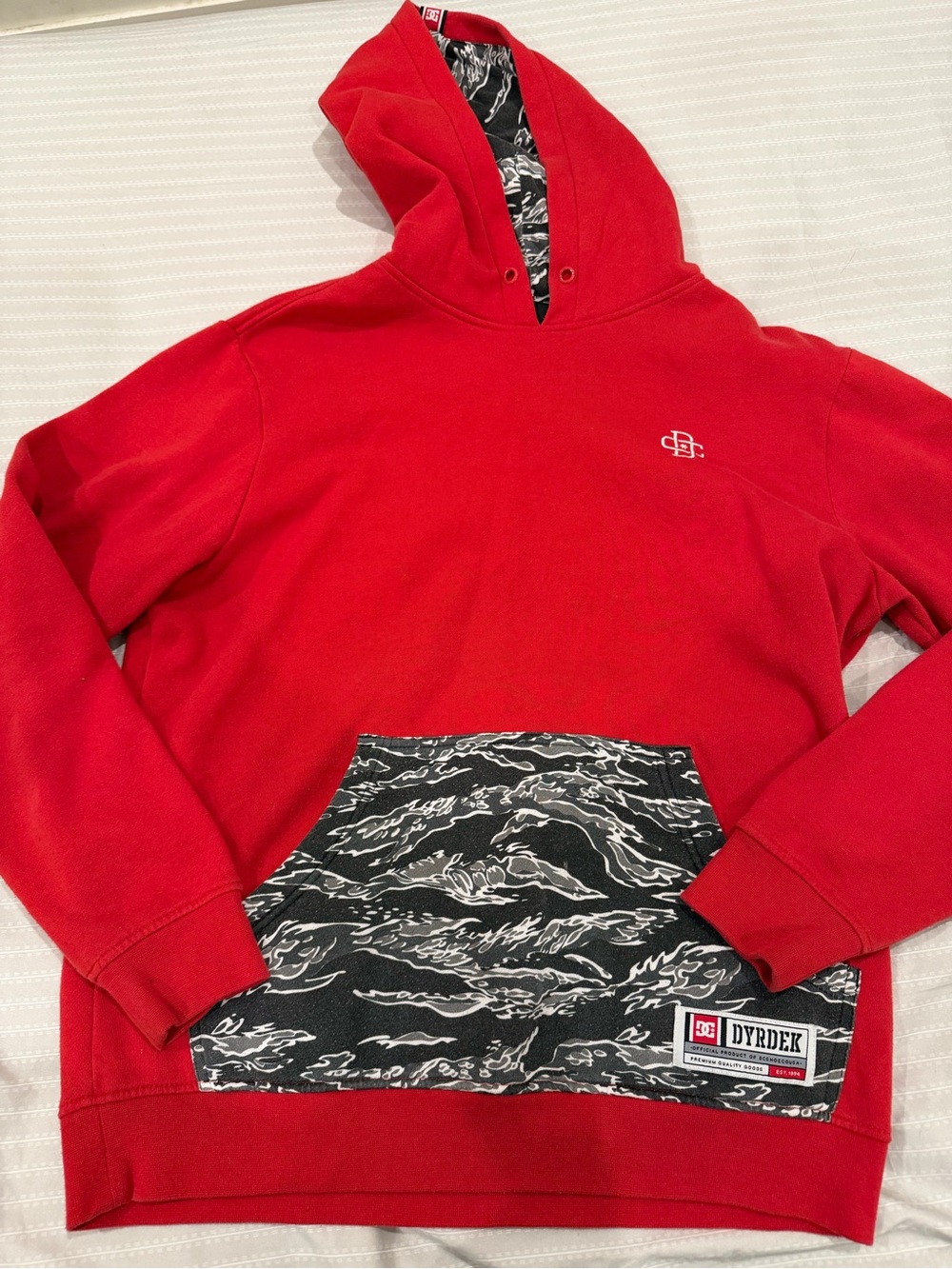 DC Red Pullover Hoodie with Black Patterned Pocket